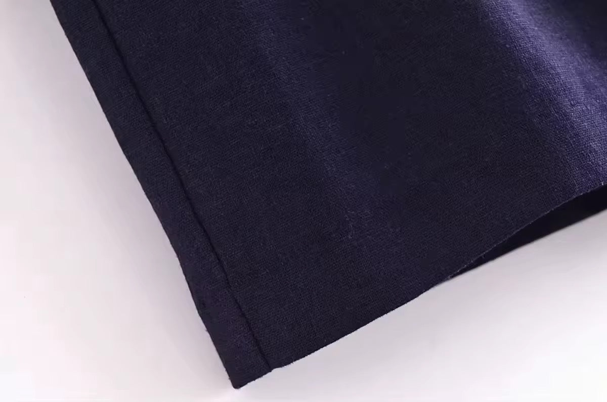 SHORT TAILLE HAUTE À PINCES
