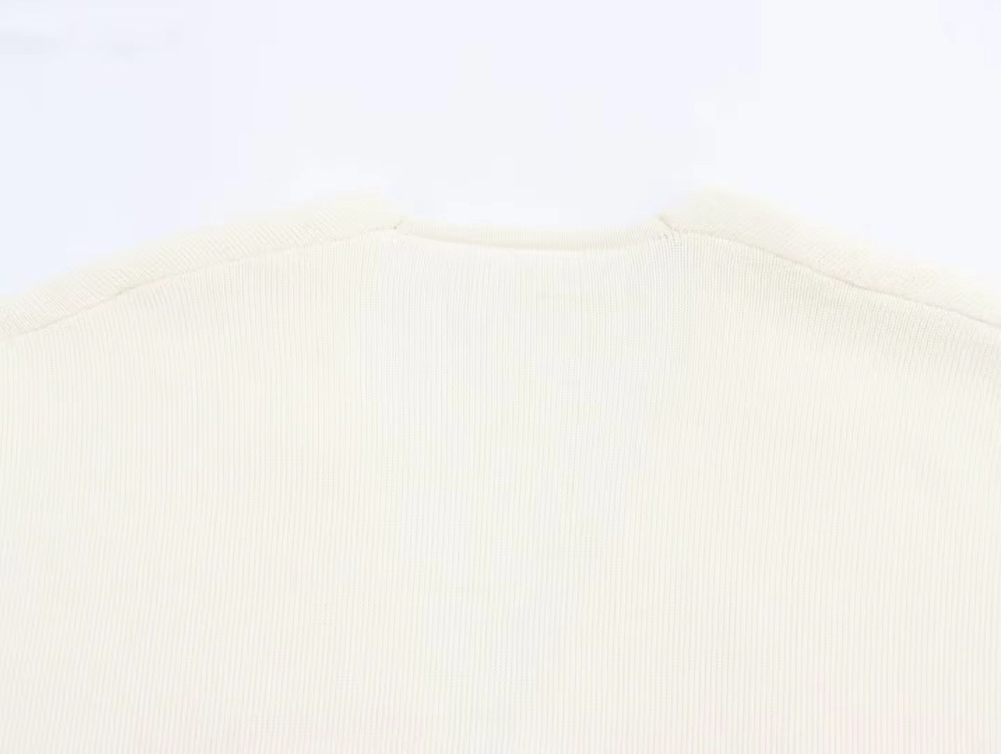 CARDIGAN CON BOTTONI ORO