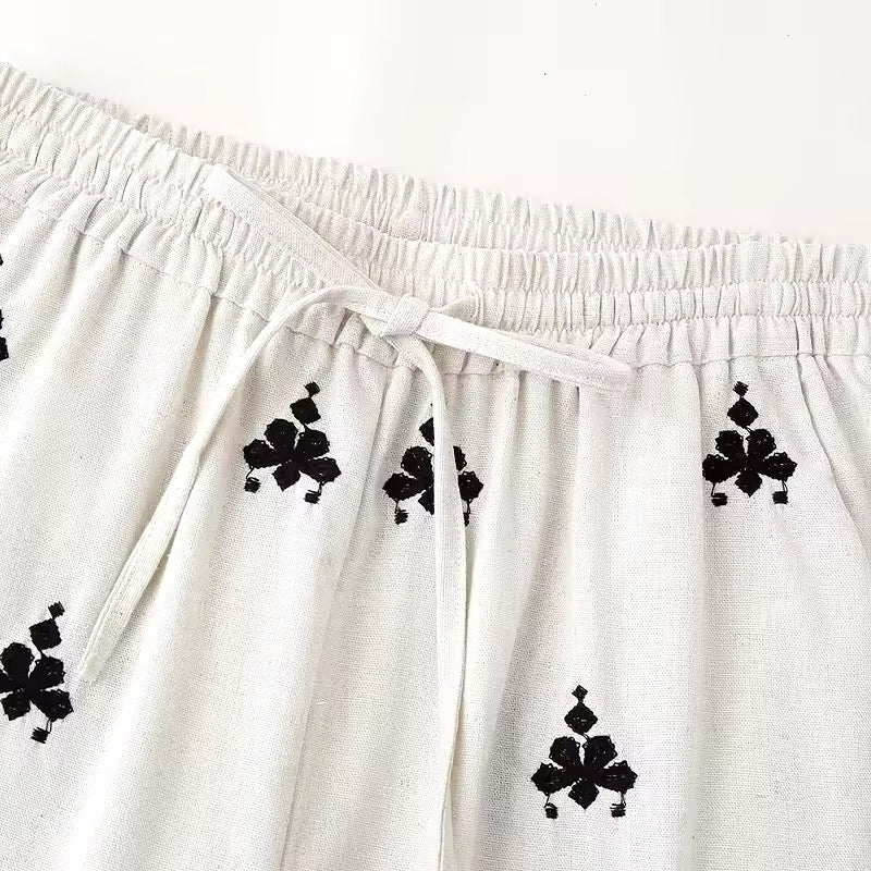 Embroidered straight pants • Women