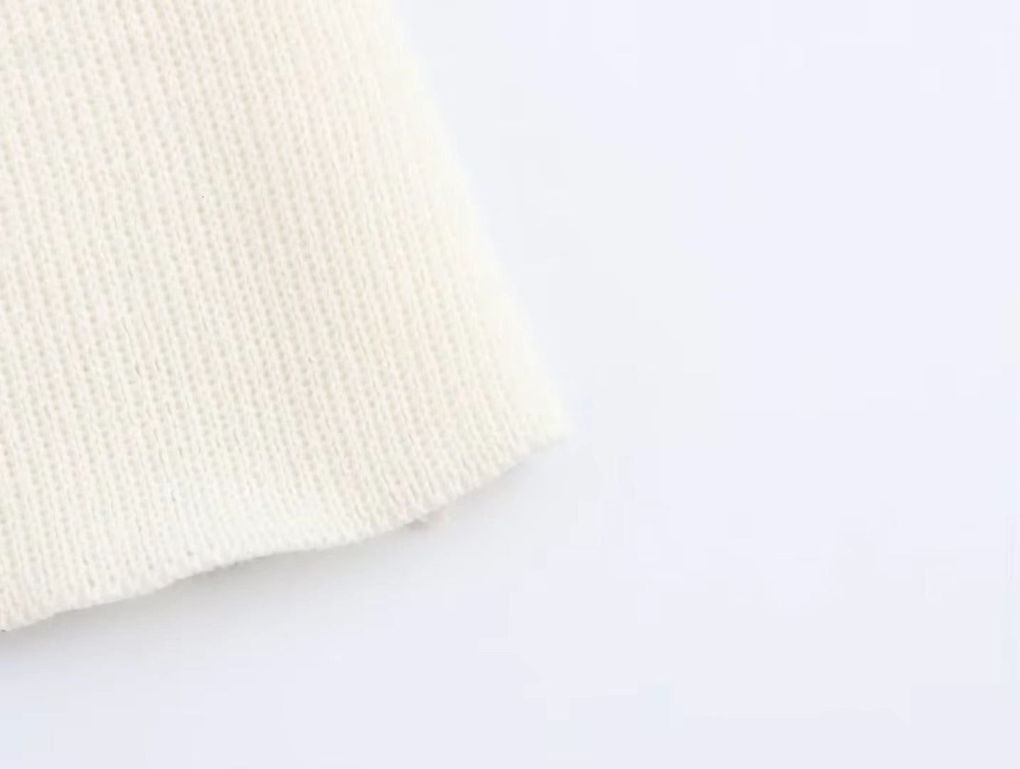 CARDIGAN CON BOTTONI ORO