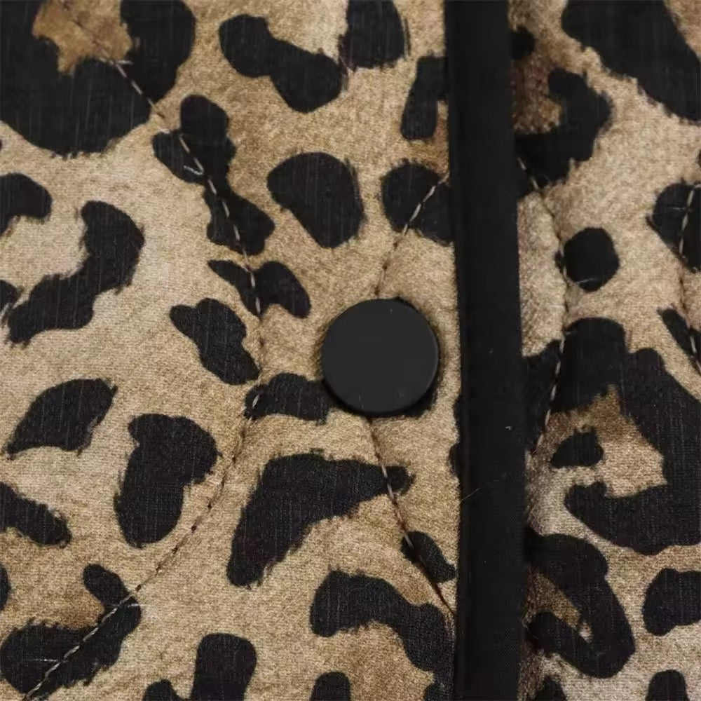 Piumino leopardato • Donna