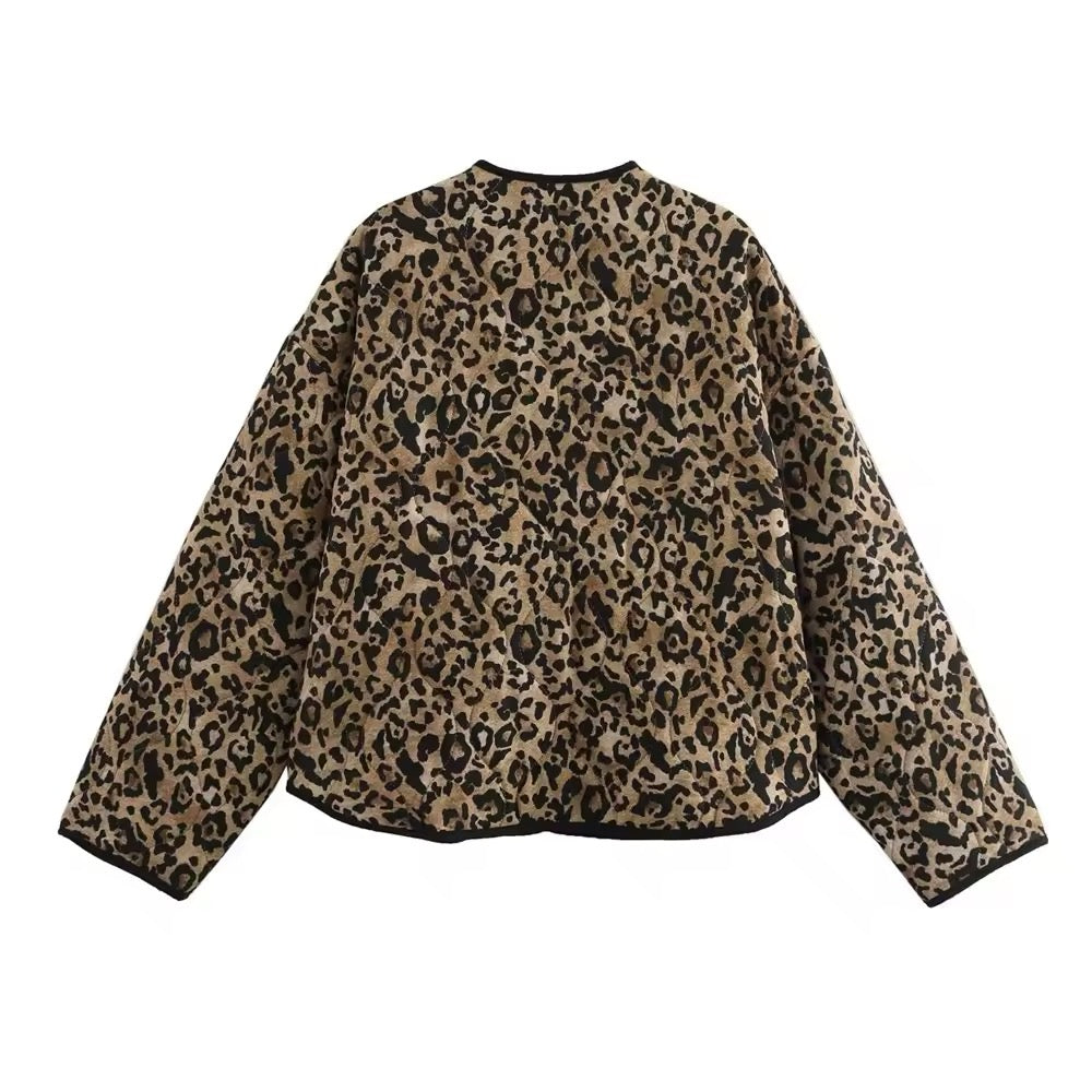 Piumino leopardato • Donna