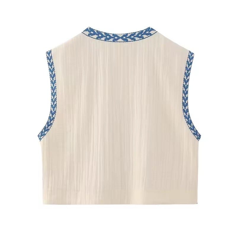 Sleeveless embroidered vest • Women