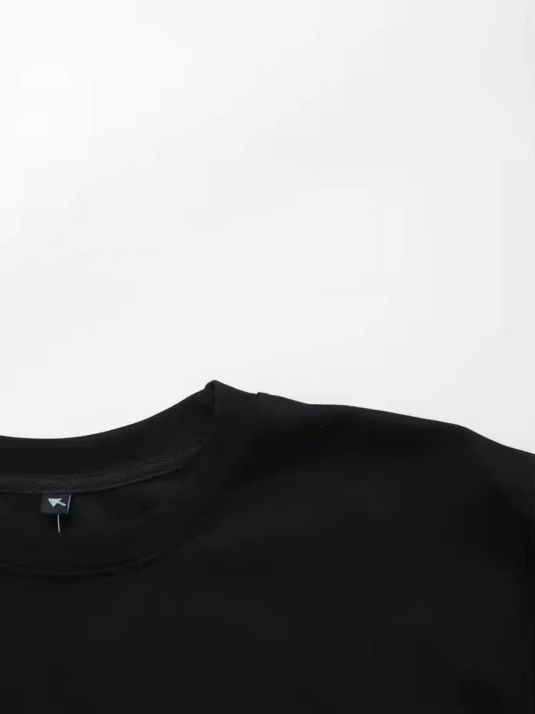 Tee-shirt oversize en coton noir minimaliste