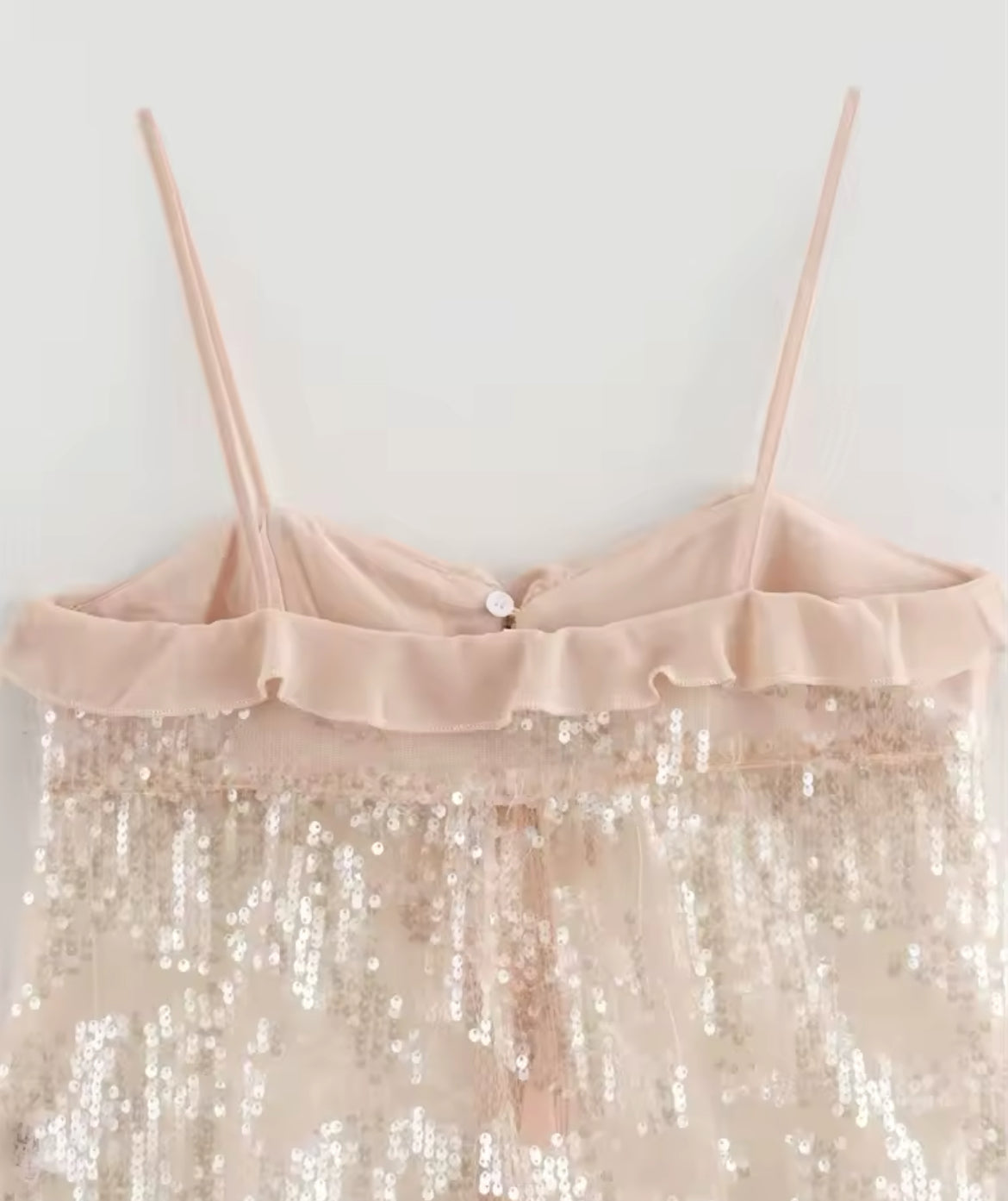 TOP CON VOLANT E PAILLETTES