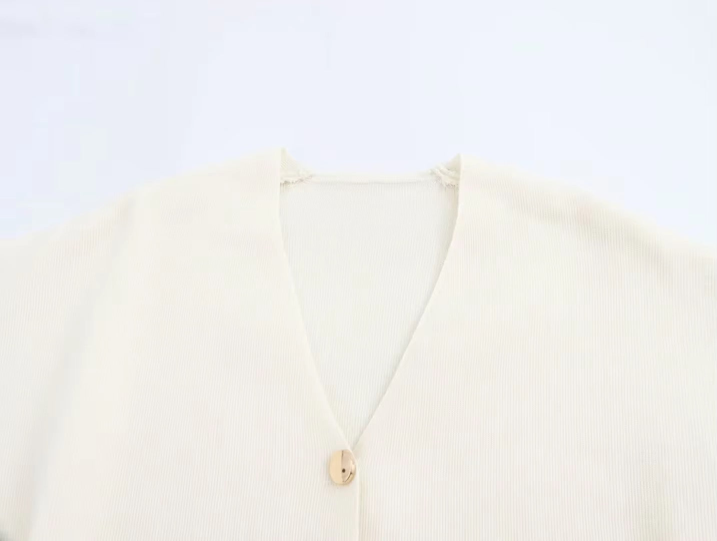 CARDIGAN CON BOTTONI ORO