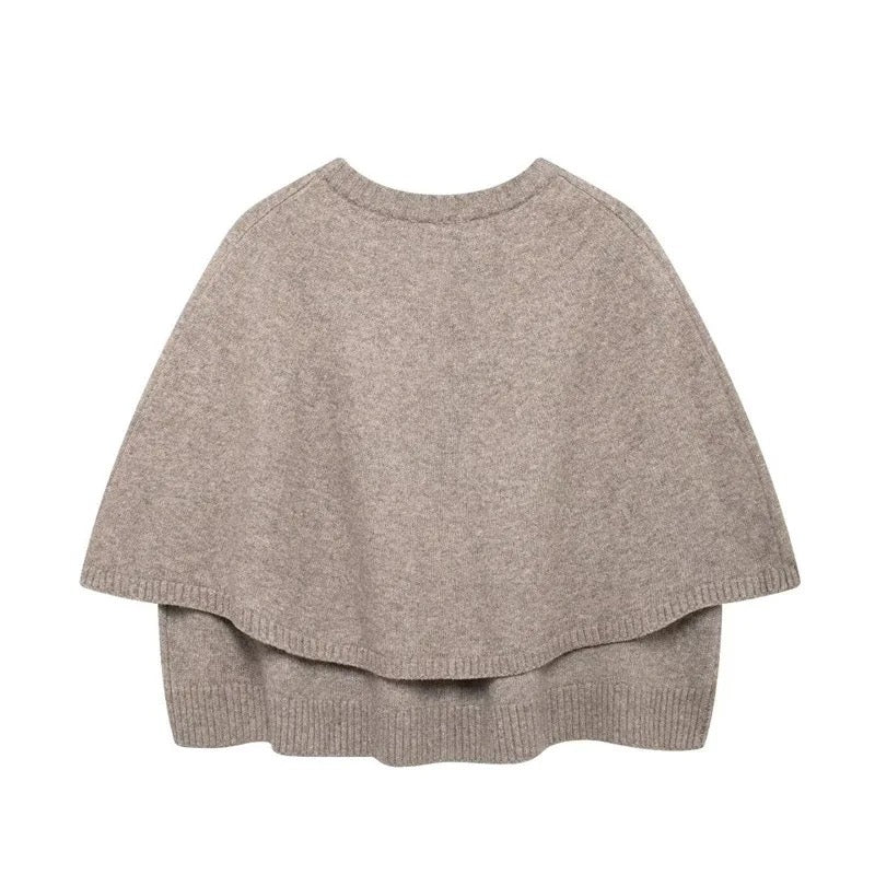 Knitted poncho • Women