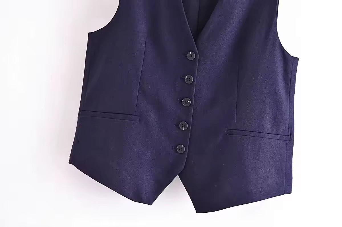 GILET SANS MANCHES BOUTONNÉ