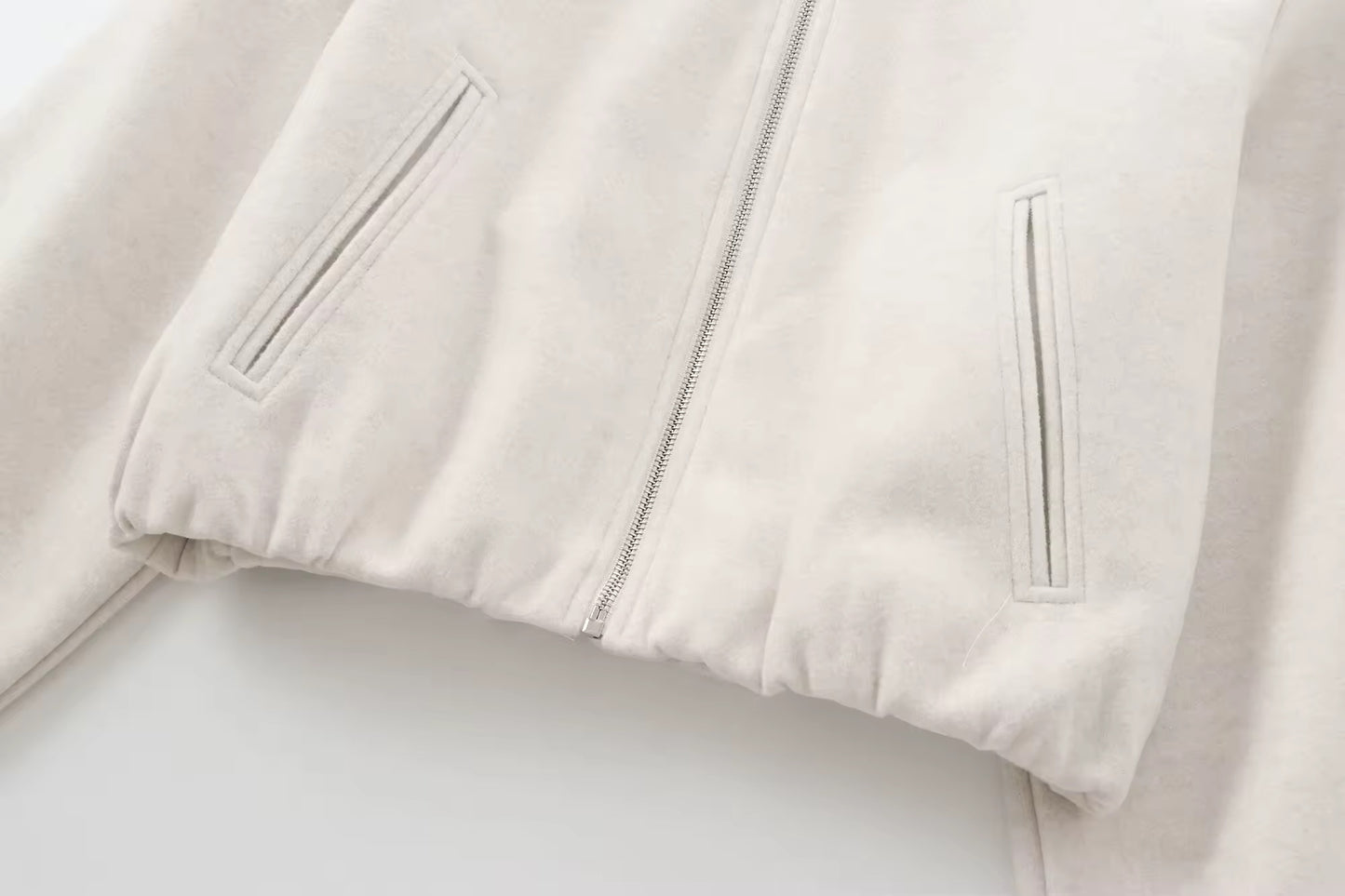 BLOUSON ZIPPÉ AVEC BASE ÉLASTIQUÉE