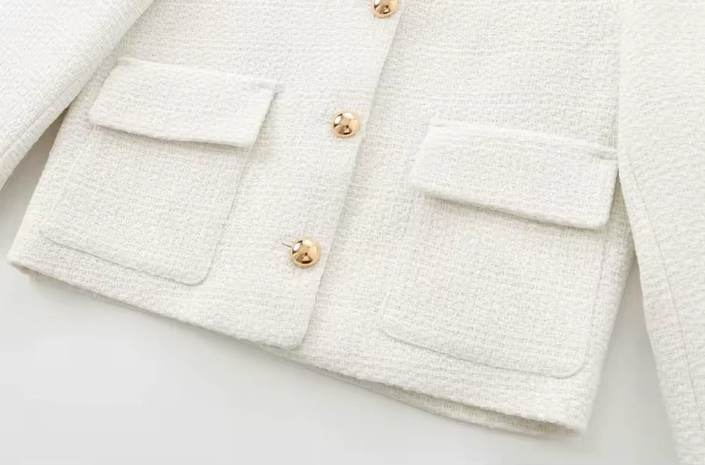 VESTE COURTE STRUCTURÉE À BOUTONS MÉTAL