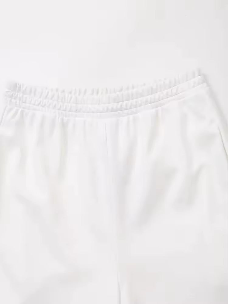 Jogging ample à taille élastique blanc minimaliste