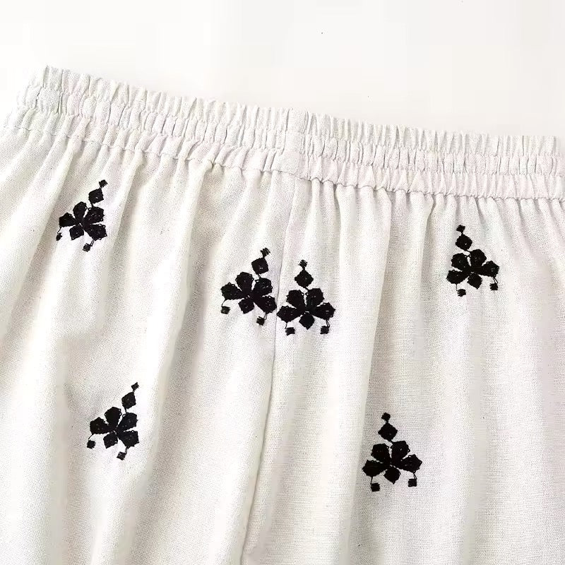 Embroidered straight pants • Women