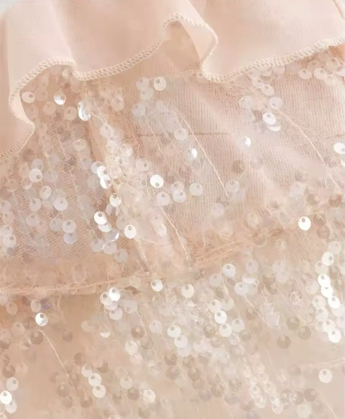 TOP CON VOLANT E PAILLETTES