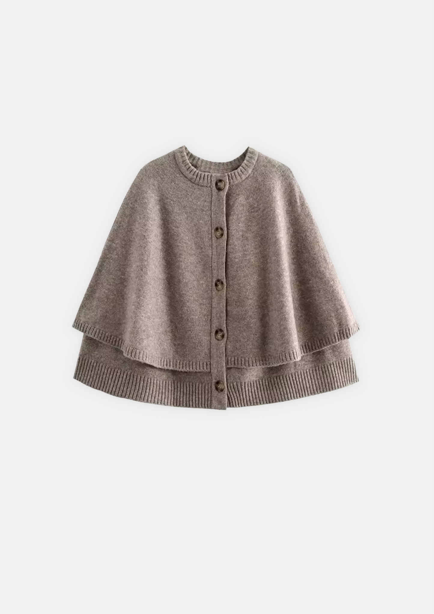 Knitted poncho • Women