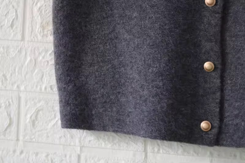 CARDIGAN CORTO CON SCOLLO A V
