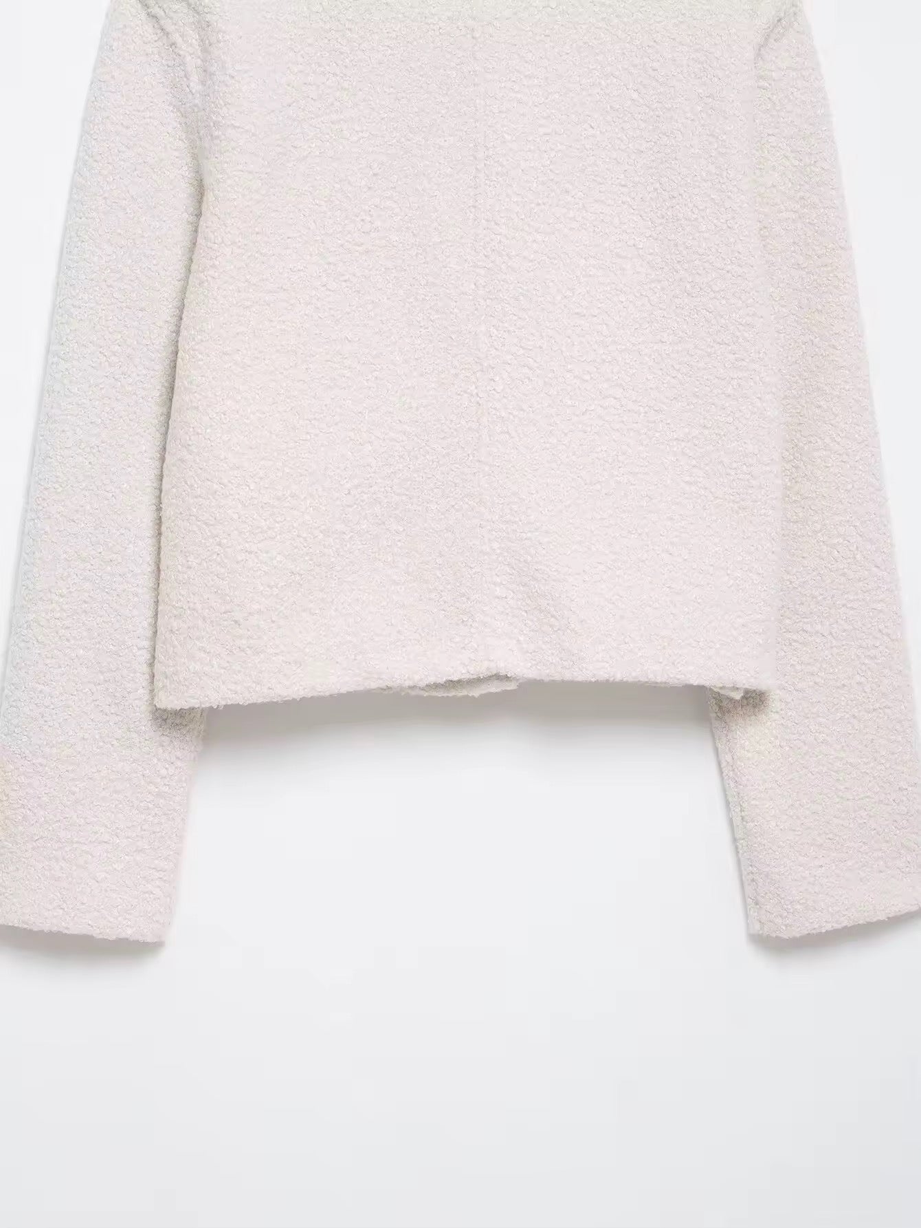 VESTE COURTE BOUCLÉ