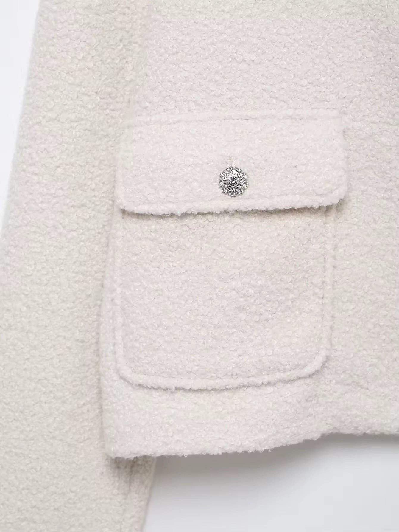 VESTE COURTE BOUCLÉ