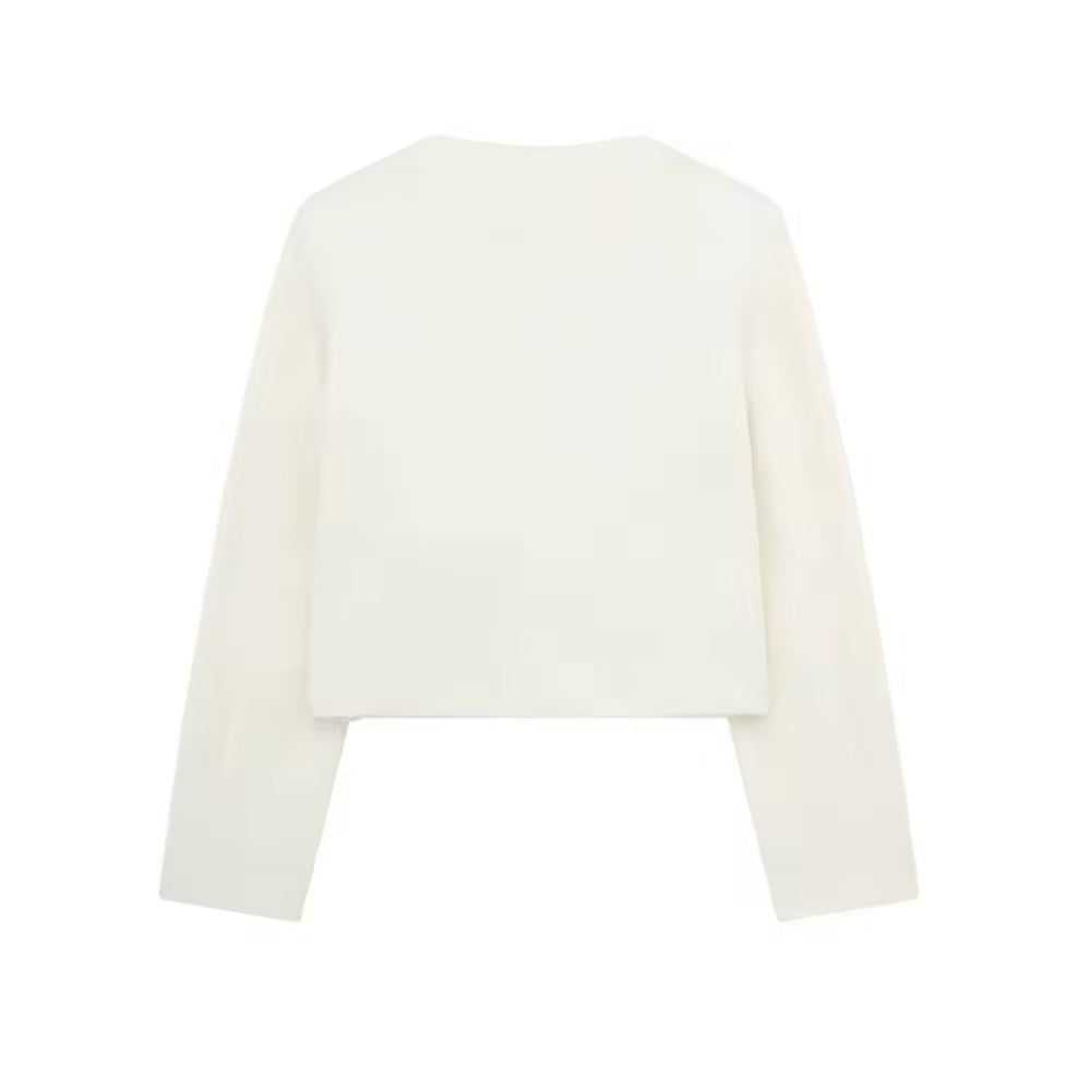 Veste élégante boutonnée en or