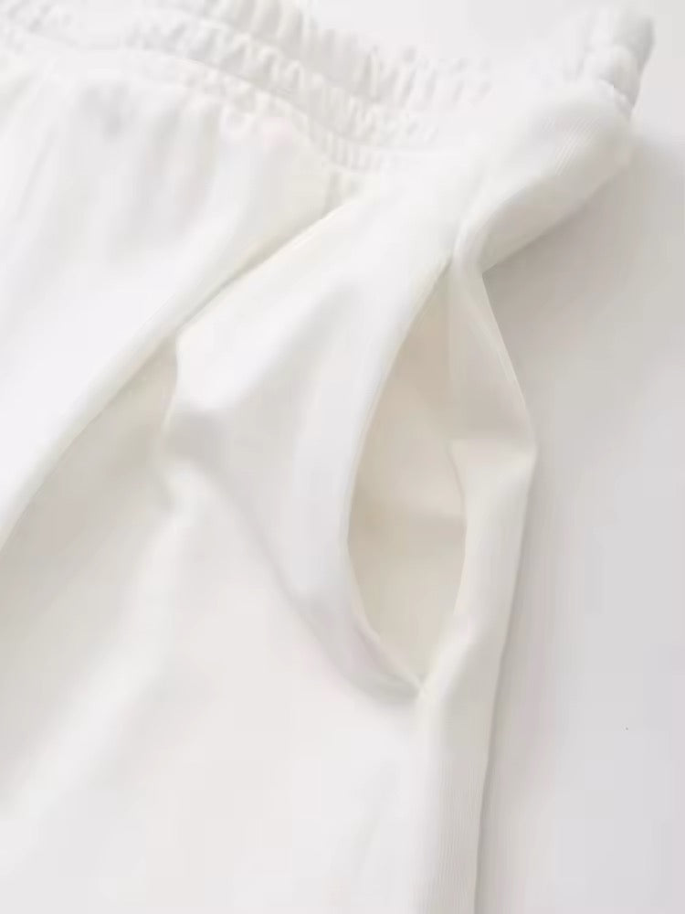 Jogging ample à taille élastique blanc minimaliste