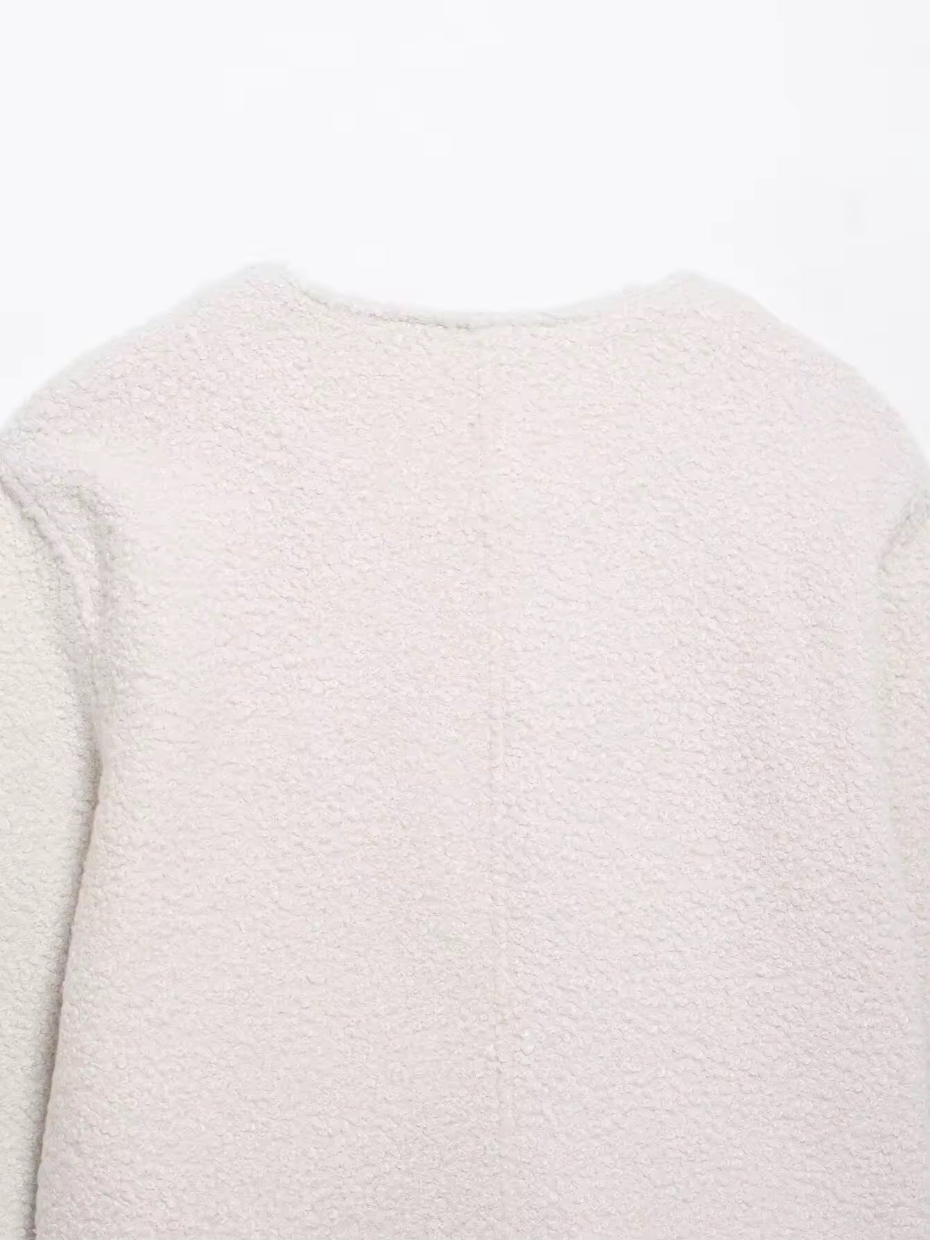 VESTE COURTE BOUCLÉ