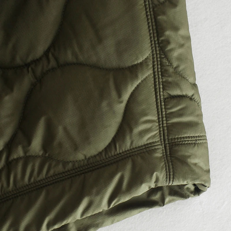 Cappotto a mezza manica • Donna 
